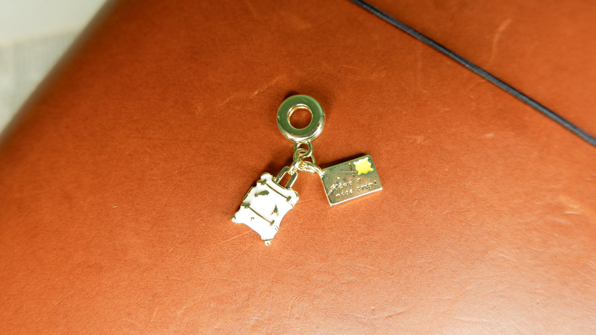 The Traveler's Correspondence Journal Charm